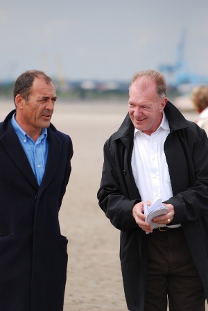 men on the shore